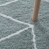 Tapis vert d'eau shaggy motifs géométrique