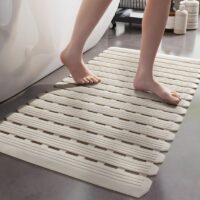 Tapis antidérapant beige à ventouse en PVC pour salle de bain