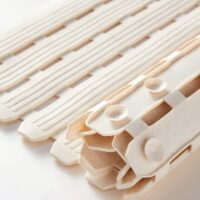Tapis antidérapant beige à ventouse en PVC pour salle de bain