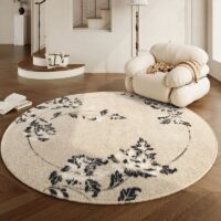Tapis beige rond motif feuillage poils courts CAMILLE