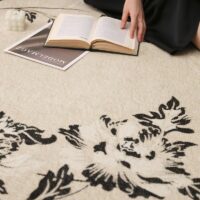 Tapis beige rond motif feuillage poils courts CAMILLE