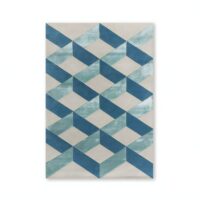 Tapis bleu et beige motifs géométriques en perspective PUXU