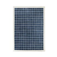 Tapis bleu grille à carreaux avec fond blanc style kilim PUXU
