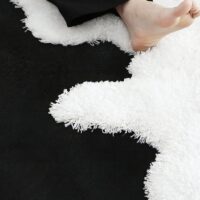 Tapis noir et blanc bi-texture design effet neige LOSTONE
