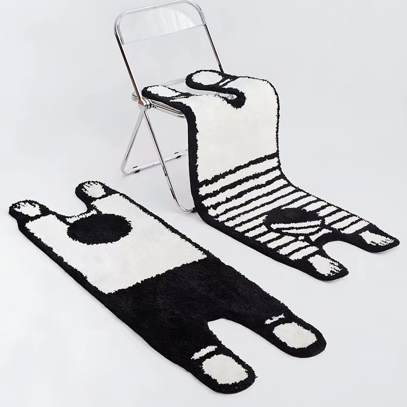 Tapis noir et blanc personnage allongé abstrait et tendance CRIORI