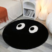 Tapis noir rond avec yeux blancs design et tendance BILE