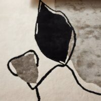 Tapis rond beige art abstrait minimalisme italien en laine PUXU