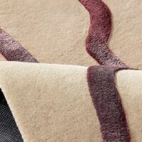 Tapis rose et beige rectangulaire motifs abstraits lignes entrelacées PUXU
