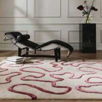 Tapis rose et beige rectangulaire motifs abstraits lignes entrelacées PUXU