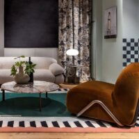 Tapis vert moderne design tendance et abstrait pour salon avec bords roses ARTO DESIGN