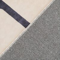 Tapis vintage beige avec motifs géométriques noirs de décoration GILLES