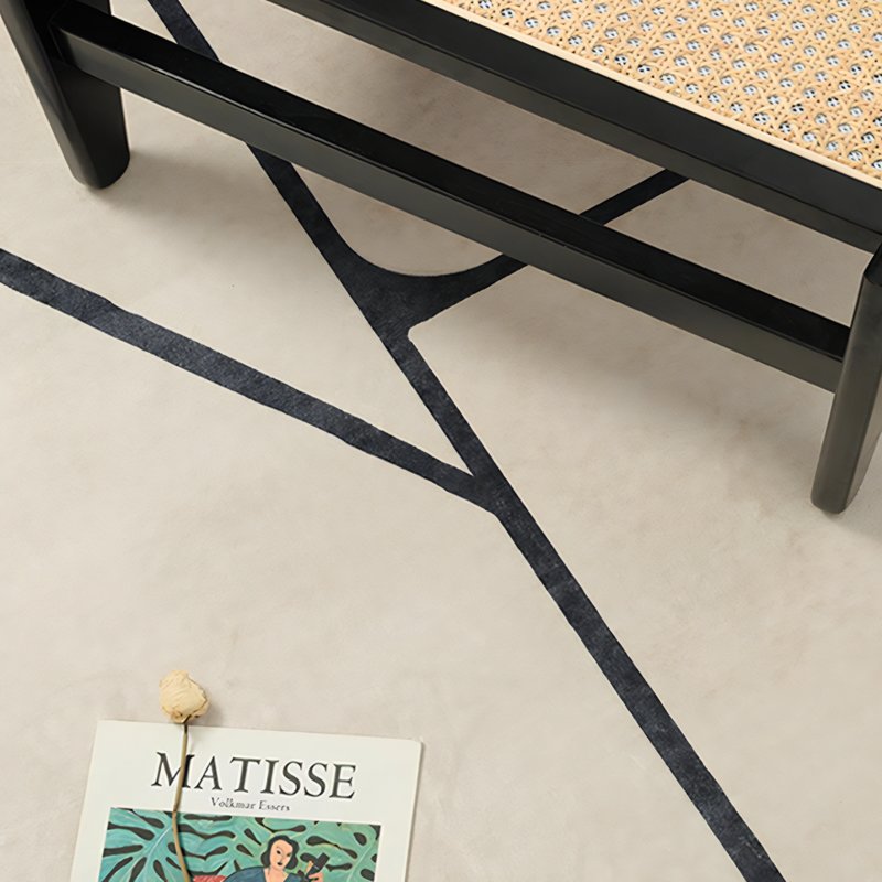 Tapis vintage beige avec motifs géométriques noirs de décoration GILLES