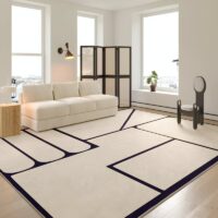 Tapis vintage beige avec motifs géométriques noirs de décoration GILLES