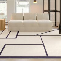 Tapis vintage beige avec motifs géométriques noirs de décoration GILLES